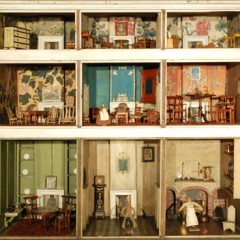 Heslington Doll's House, Early 18th Century, featuring six rooms. Top row, three bedrooms. Middle row, three sitting rooms. Bottom row, left to right, dining room, reception hall, kitchen.